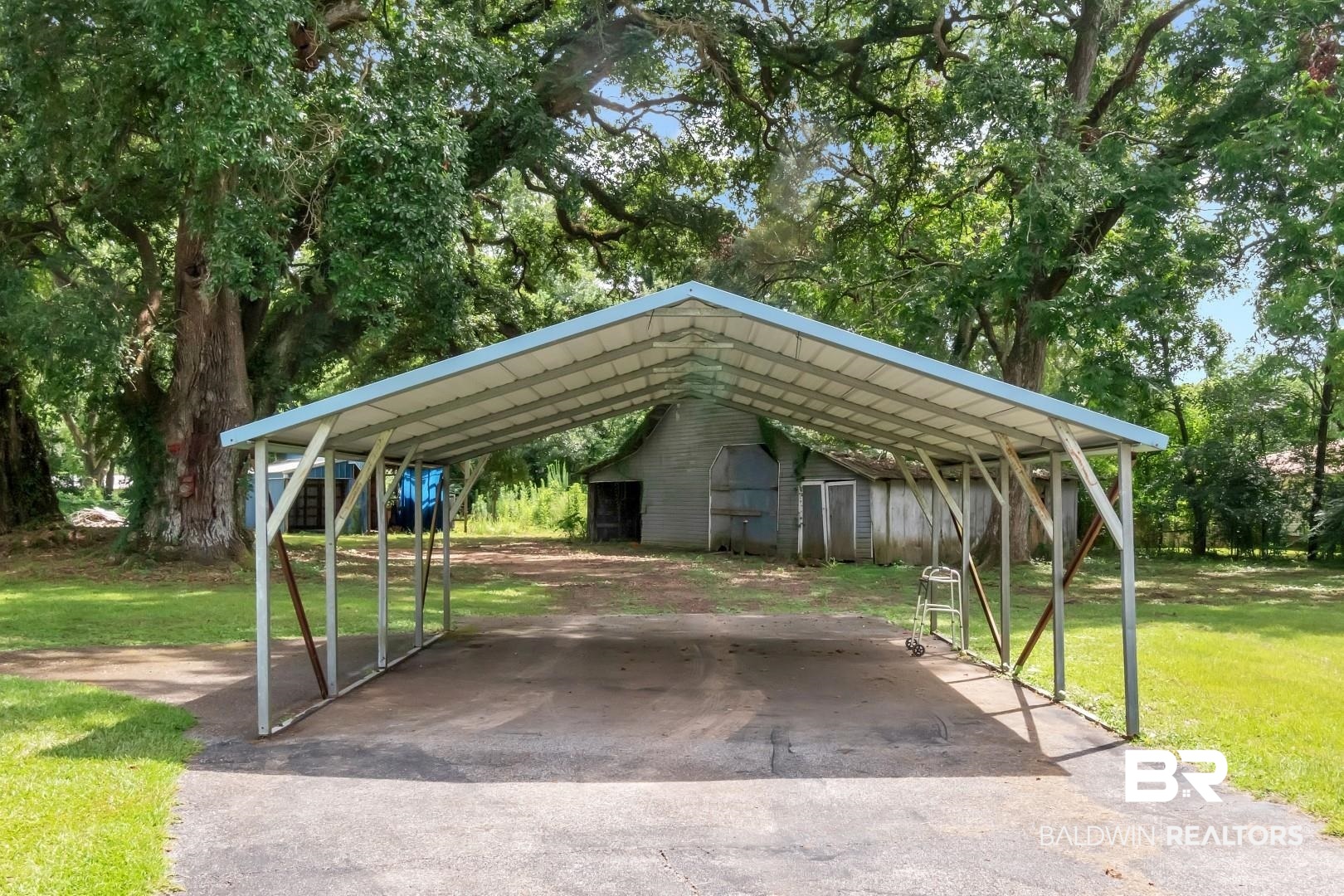 12751 Zanzibar Road Grand Bay, AL 36541 - Photo 28 of 30 View of vehicle parking with a carport and a yard