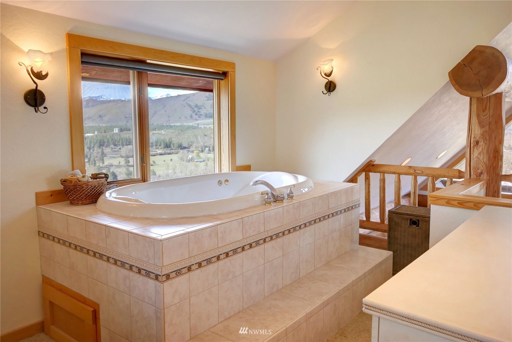 20 Pony Road Winthrop, WA 98862 - Photo 23 of 40 a spacious bathroom with a tub and a large window