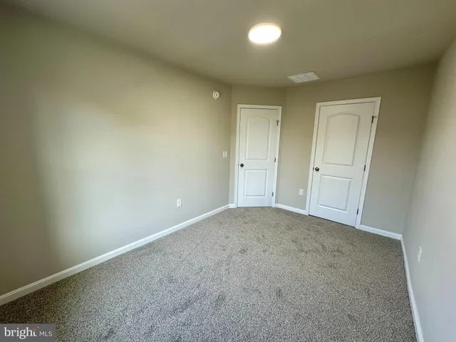 an empty room with a natural light