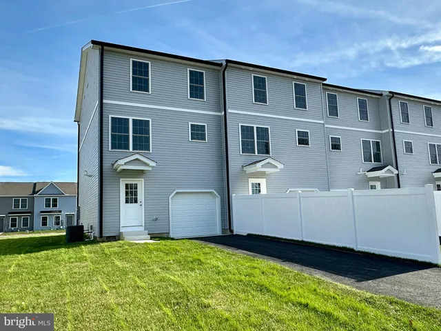 a front view of house with yard