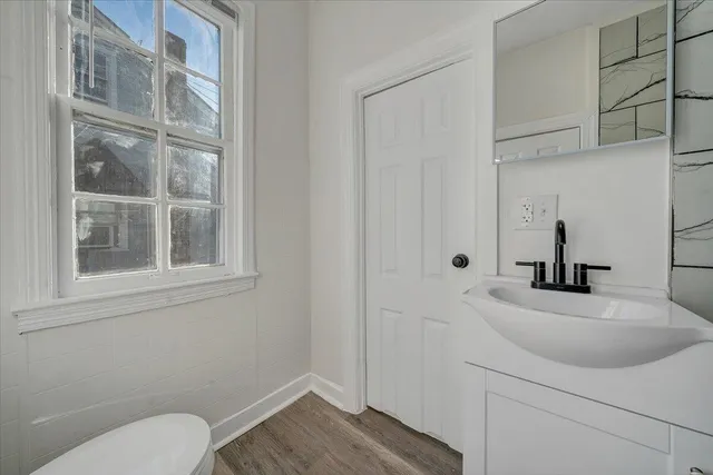 a bathroom with a sink and a shower