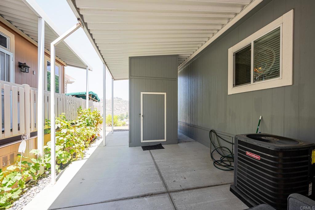 4650 Dulin Road, Unit 192 Fallbrook, CA 92003 - Photo 33 of 42 a backyard of a house with outdoor seating