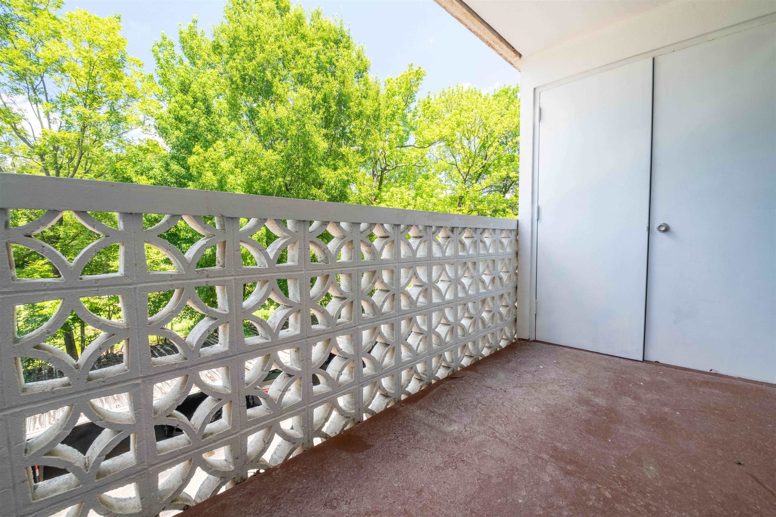 3080 Walnut Grove Road, Unit 306 Memphis, TN 38111 - Photo 7 of 18 Private balcony with decorative block railing, offering an open-air extension
