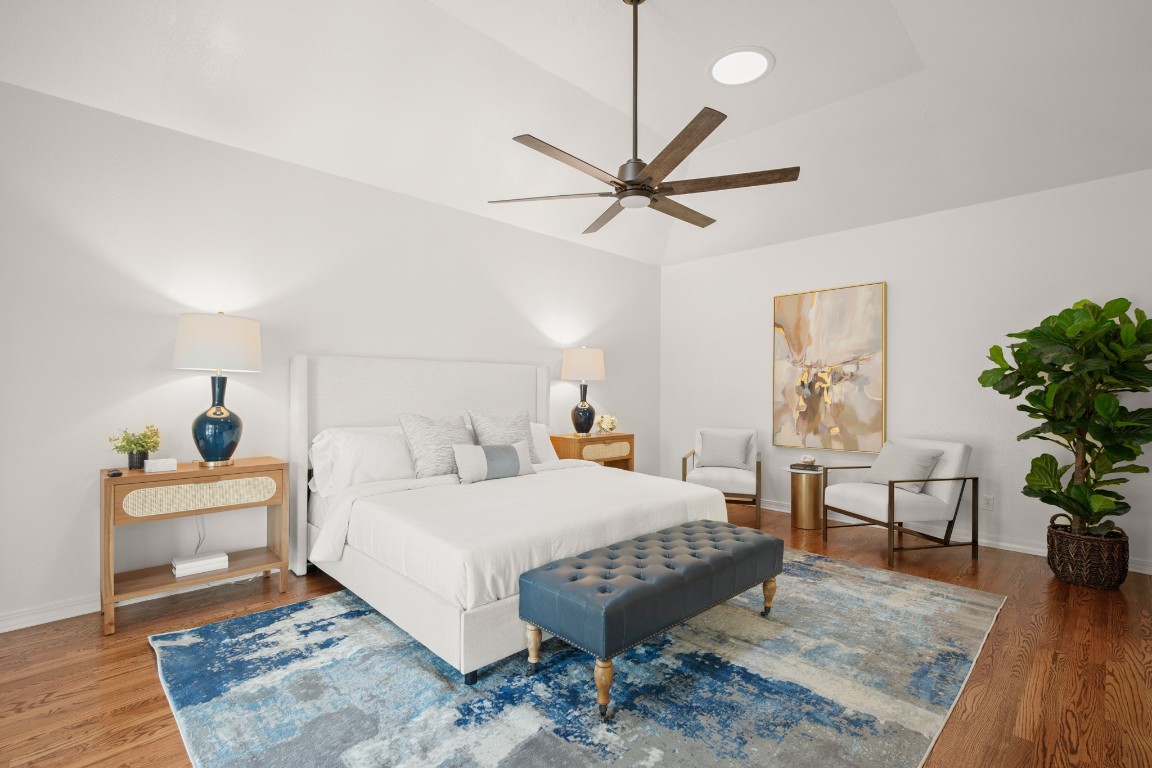 4906 Bob Cat Run Austin, TX 78731 - Photo 10 of 37 Bedroom featuring wood finished floors, ceiling fan, and recessed lighting