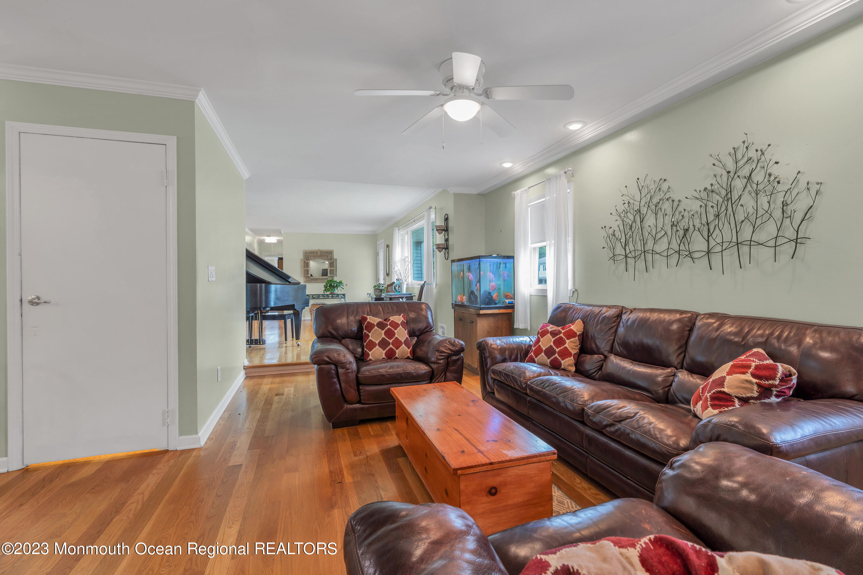 36 Westbrook Road Howell, NJ 07731 - Photo 12 of 49 a living room with furniture and a wooden floor