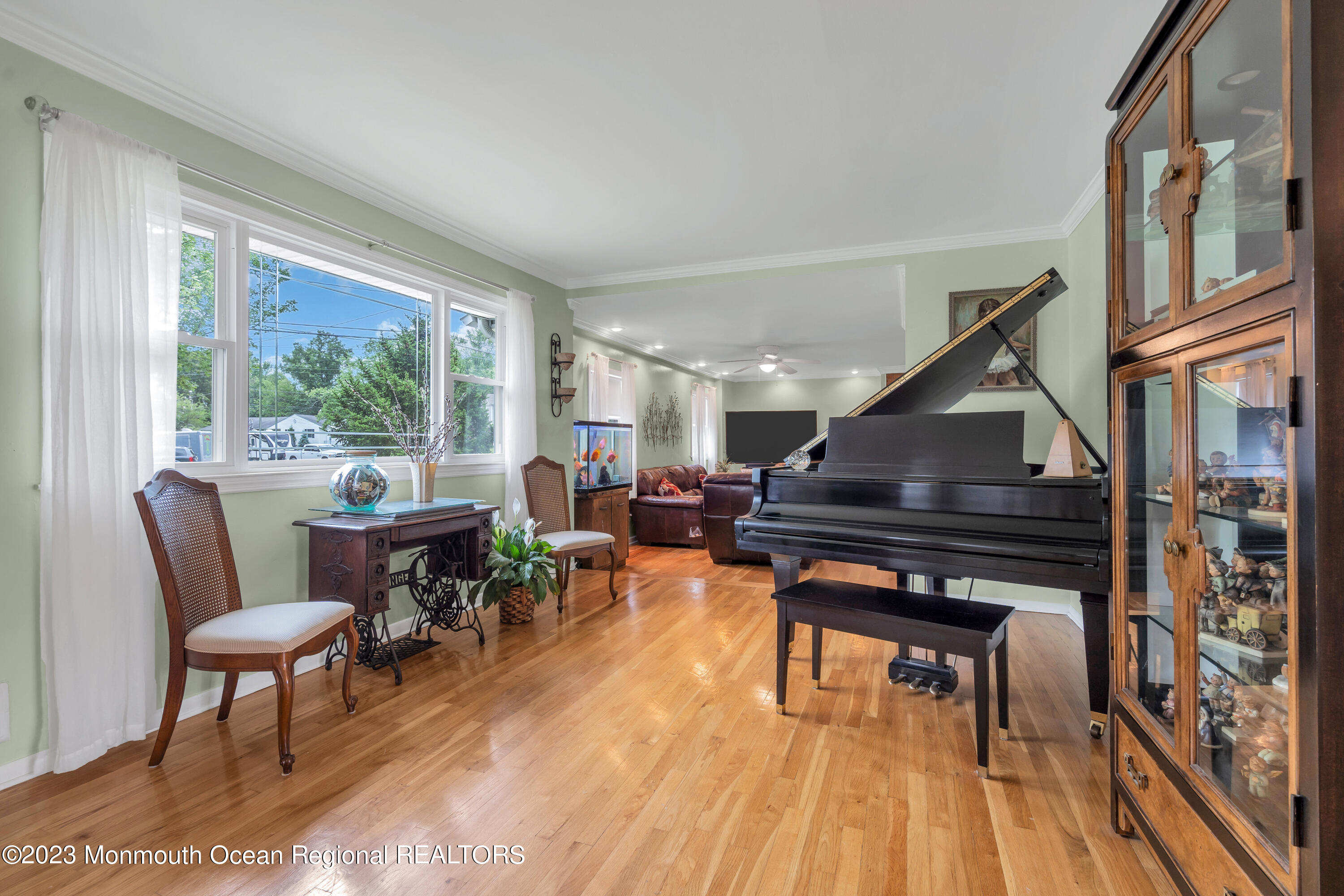 36 Westbrook Road Howell, NJ 07731 - Photo 9 of 49 a living room with furniture a piano and a potted plant