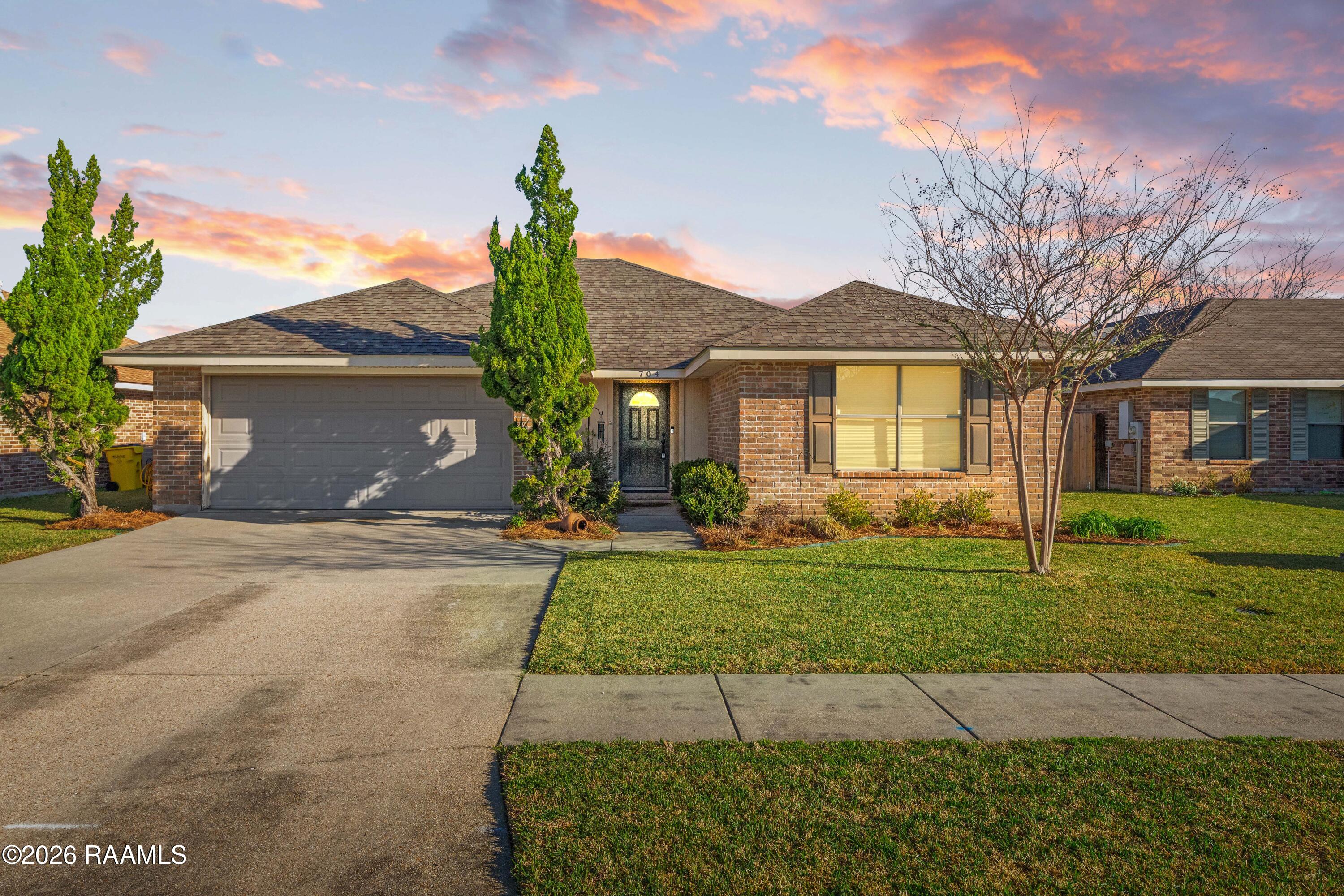 704 Breaux Road Lafayette, LA 70507 - Photo 1 of 26 twilight