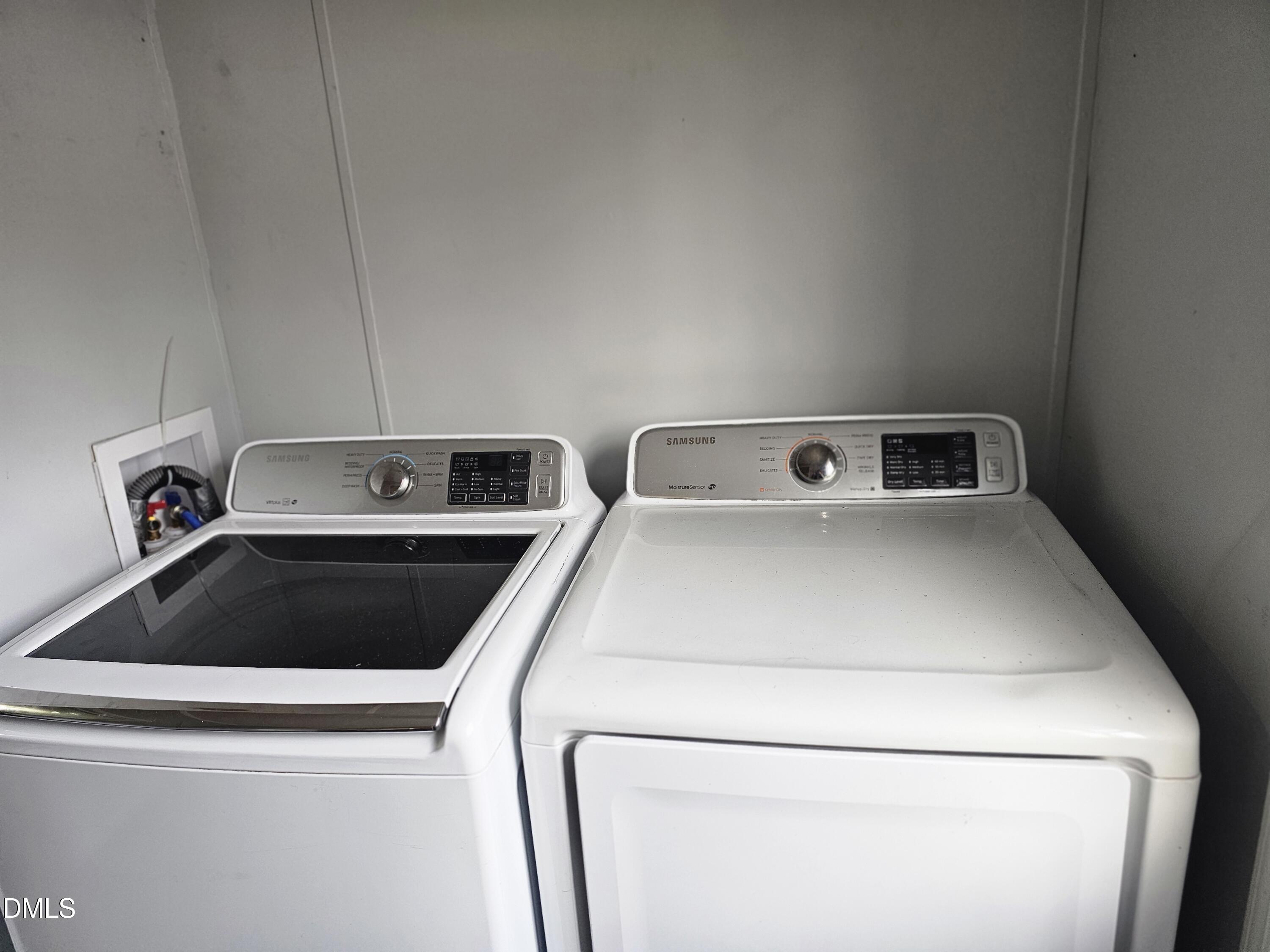 4762 Old Allensville Road Roxboro, NC 27574 - Photo 27 of 33 a utility room with dryer and washer