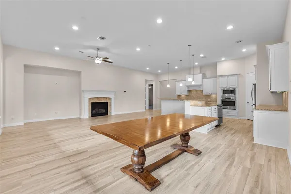a view of a bathroom with a shower and a tub
