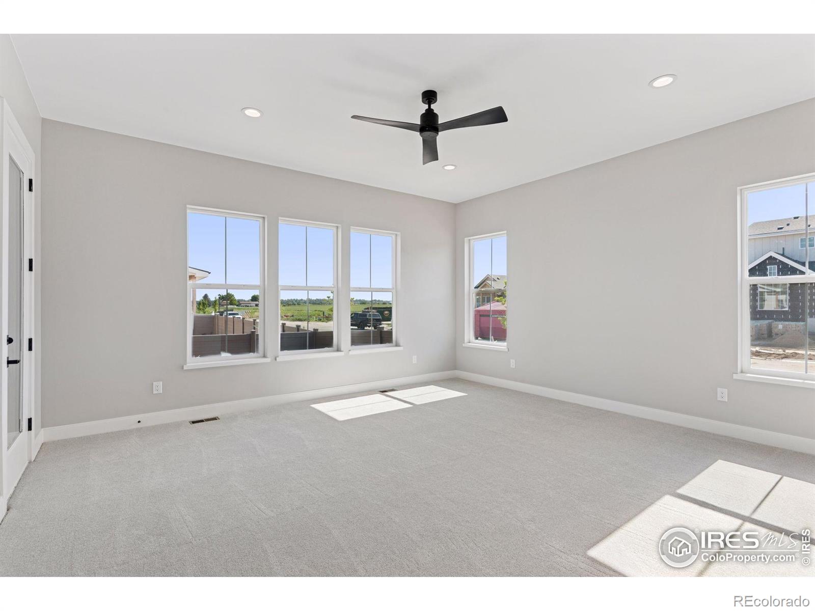 953 William Way Berthoud, CO 80513 - Photo 11 of 20 a view of an empty room with a window