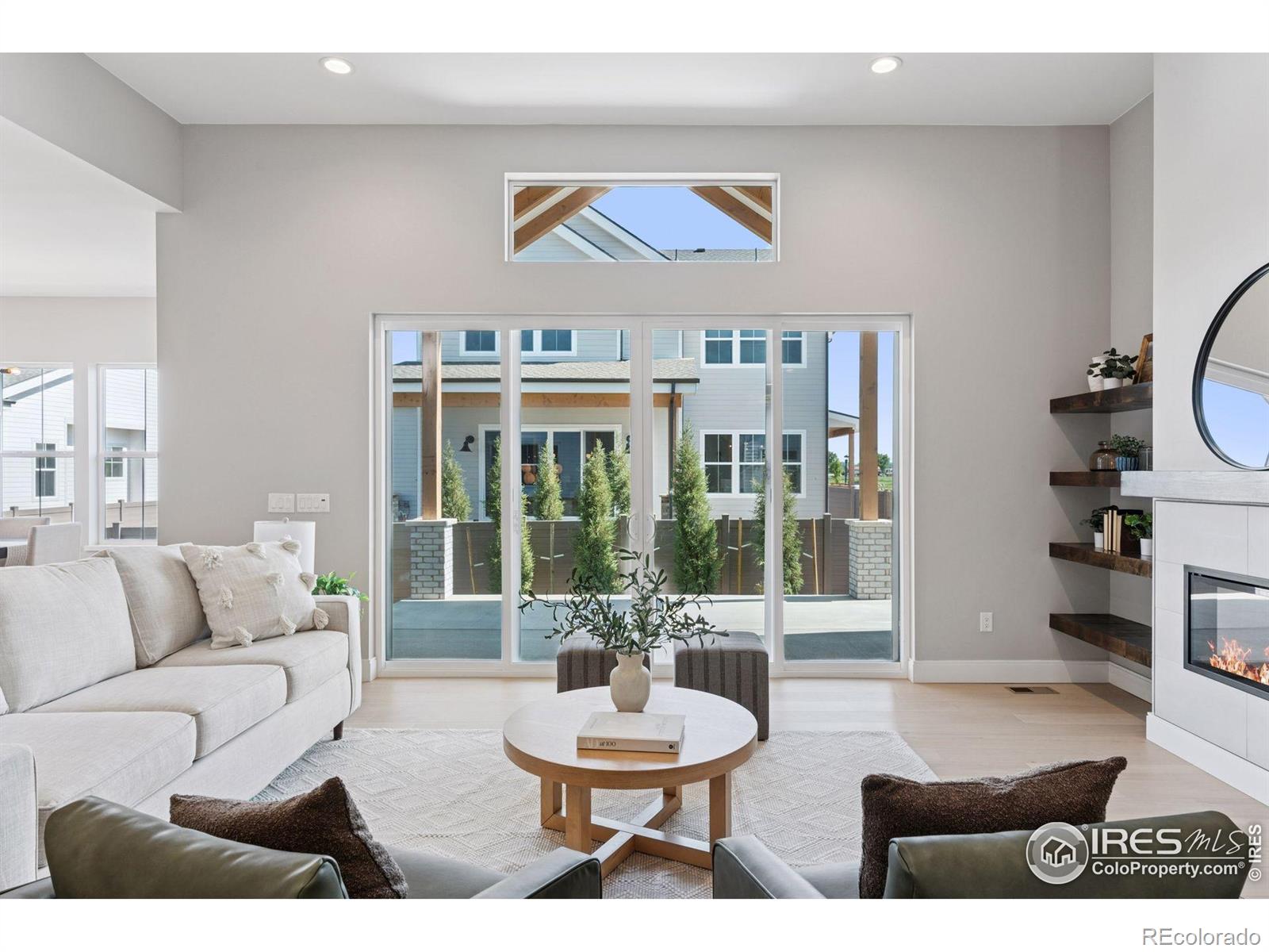 953 William Way Berthoud, CO 80513 - Photo 2 of 20 a living room with furniture and a potted plant