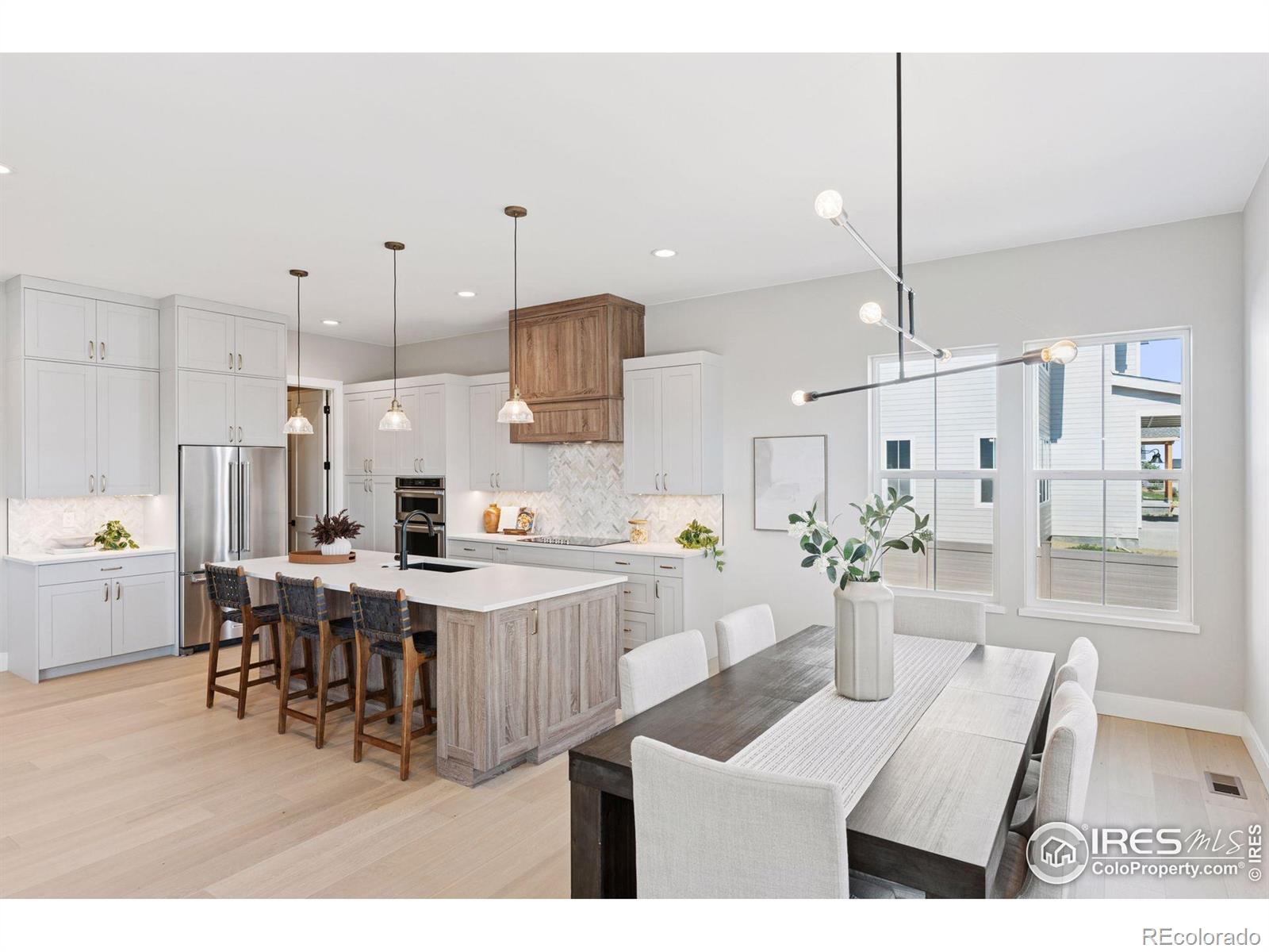 953 William Way Berthoud, CO 80513 - Photo 7 of 20 a very nice looking dining room with a table and chairs
