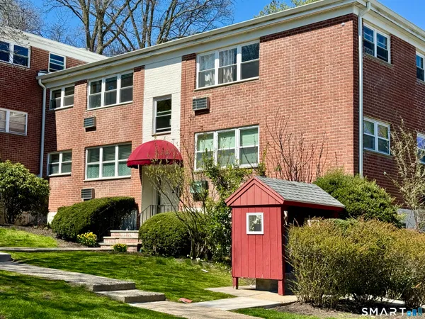 a front view of a house having yard