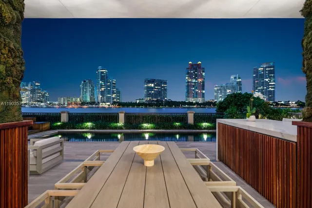 a view of balcony with furniture