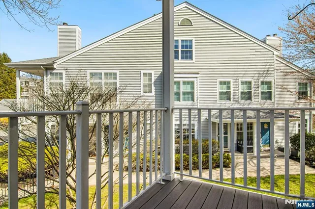 a view of a yard with a cars