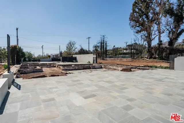 a view of the terrace along with trees