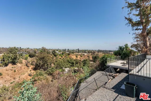 a view of a terrace with a bench