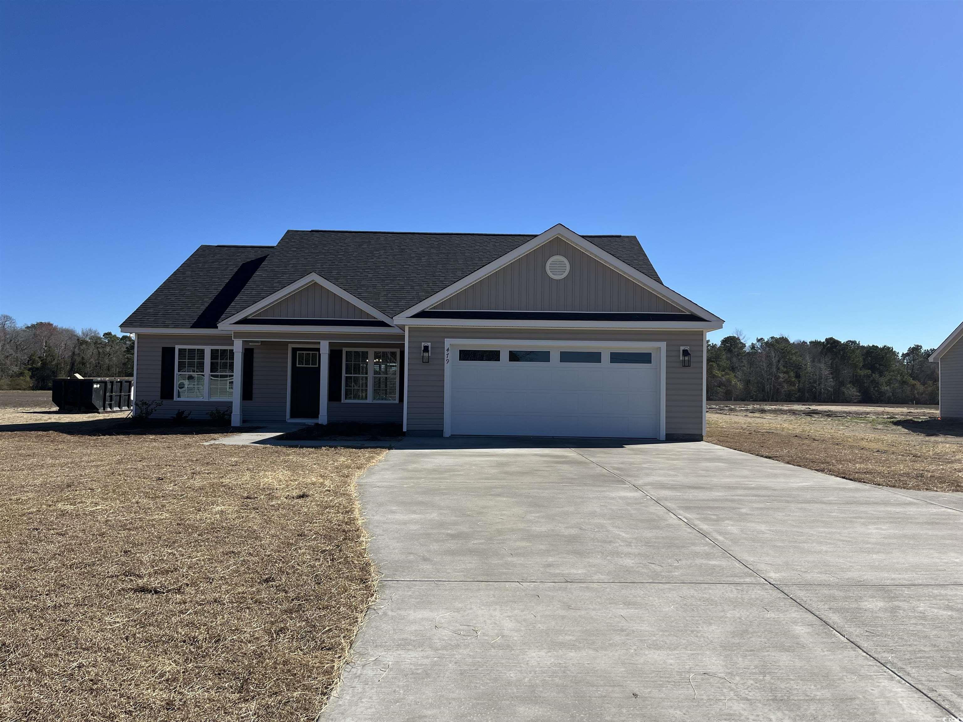 479 Highway 348 Loris, SC 29569 - Photo 1 of 13 View of front of property with an attached garage,