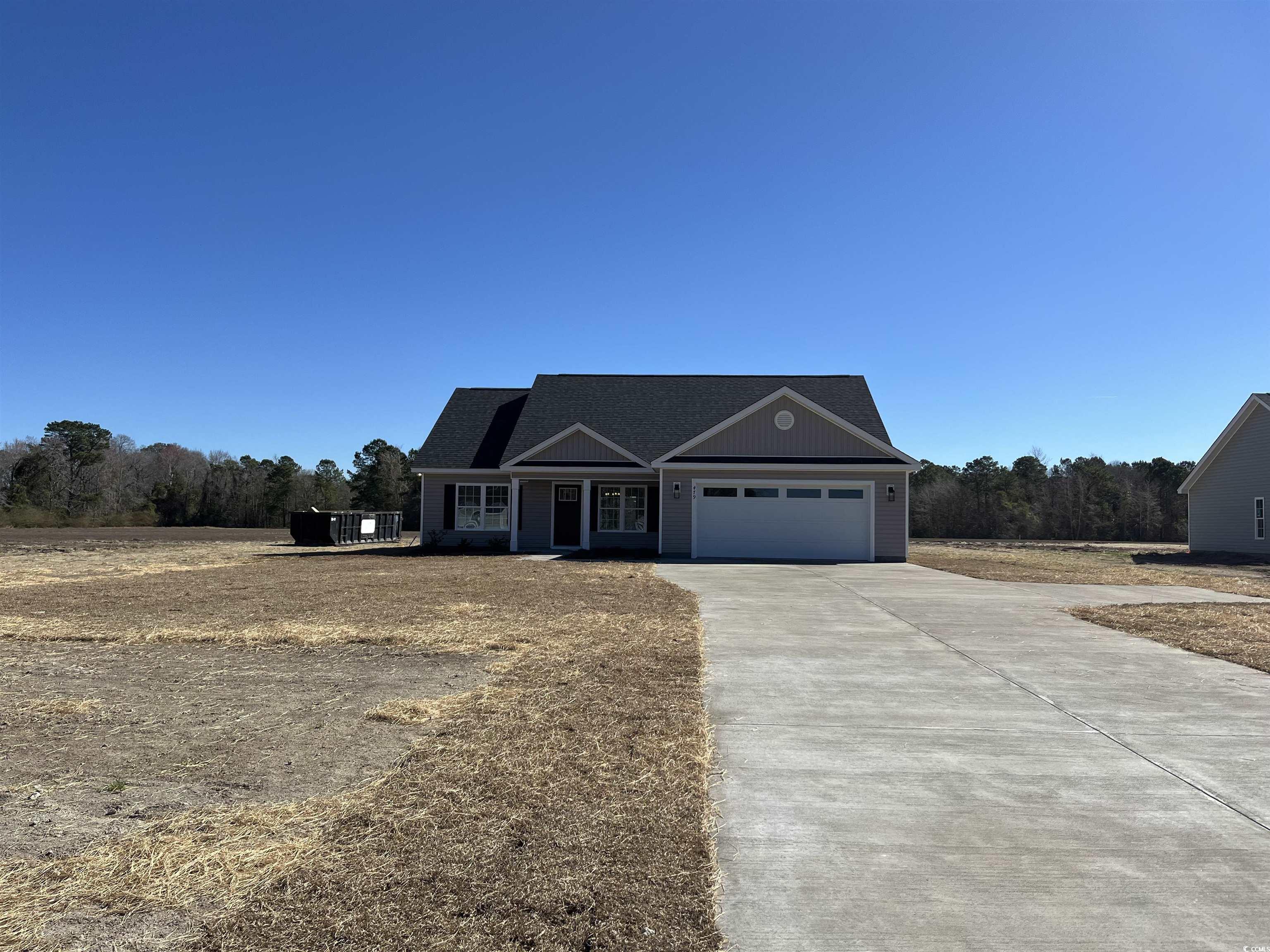479 Highway 348 Loris, SC 29569 - Photo 2 of 13 View of front of house featuring an attached garag
