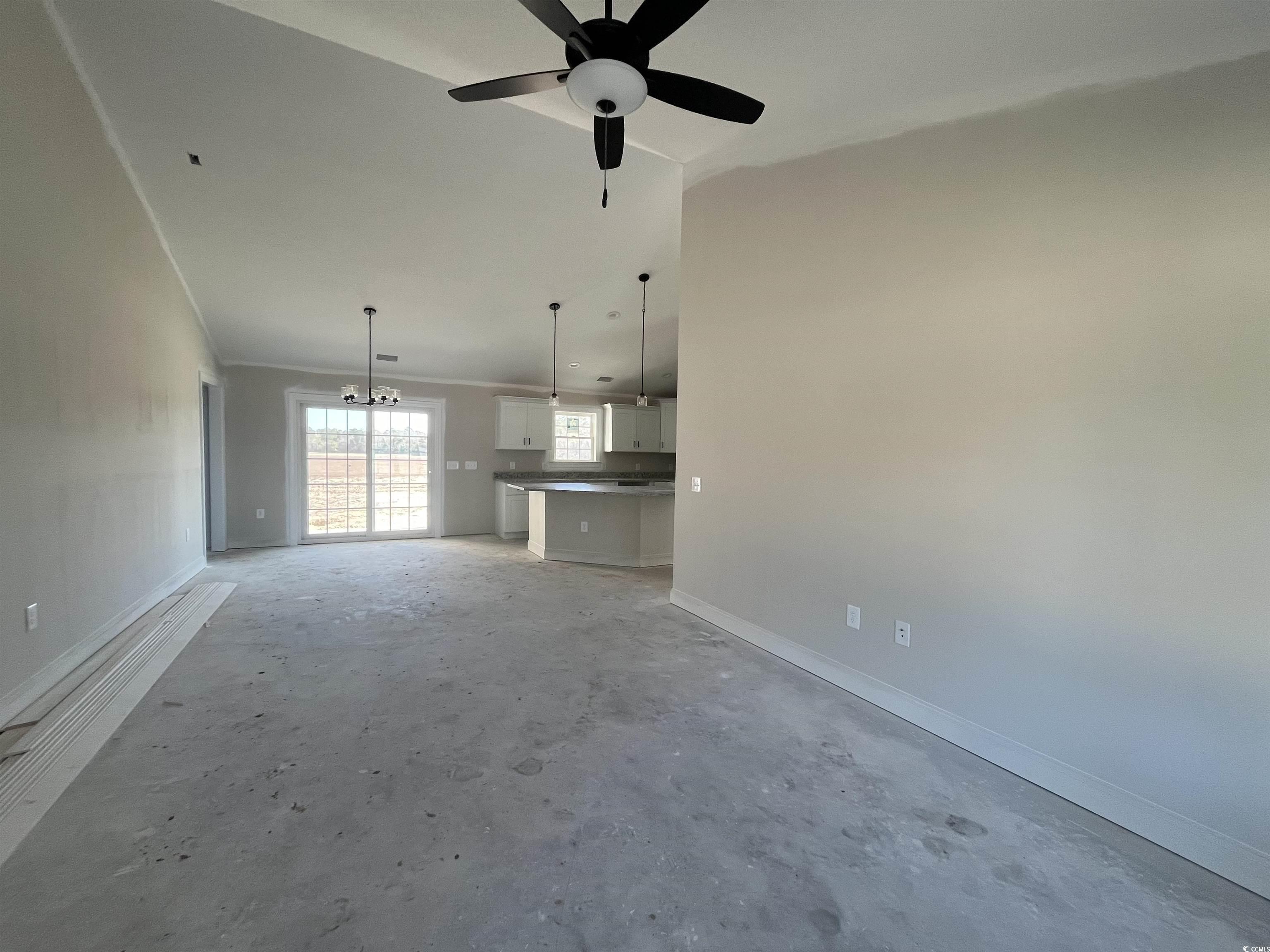 479 Highway 348 Loris, SC 29569 - Photo 4 of 13 Unfurnished living room with ceiling fan