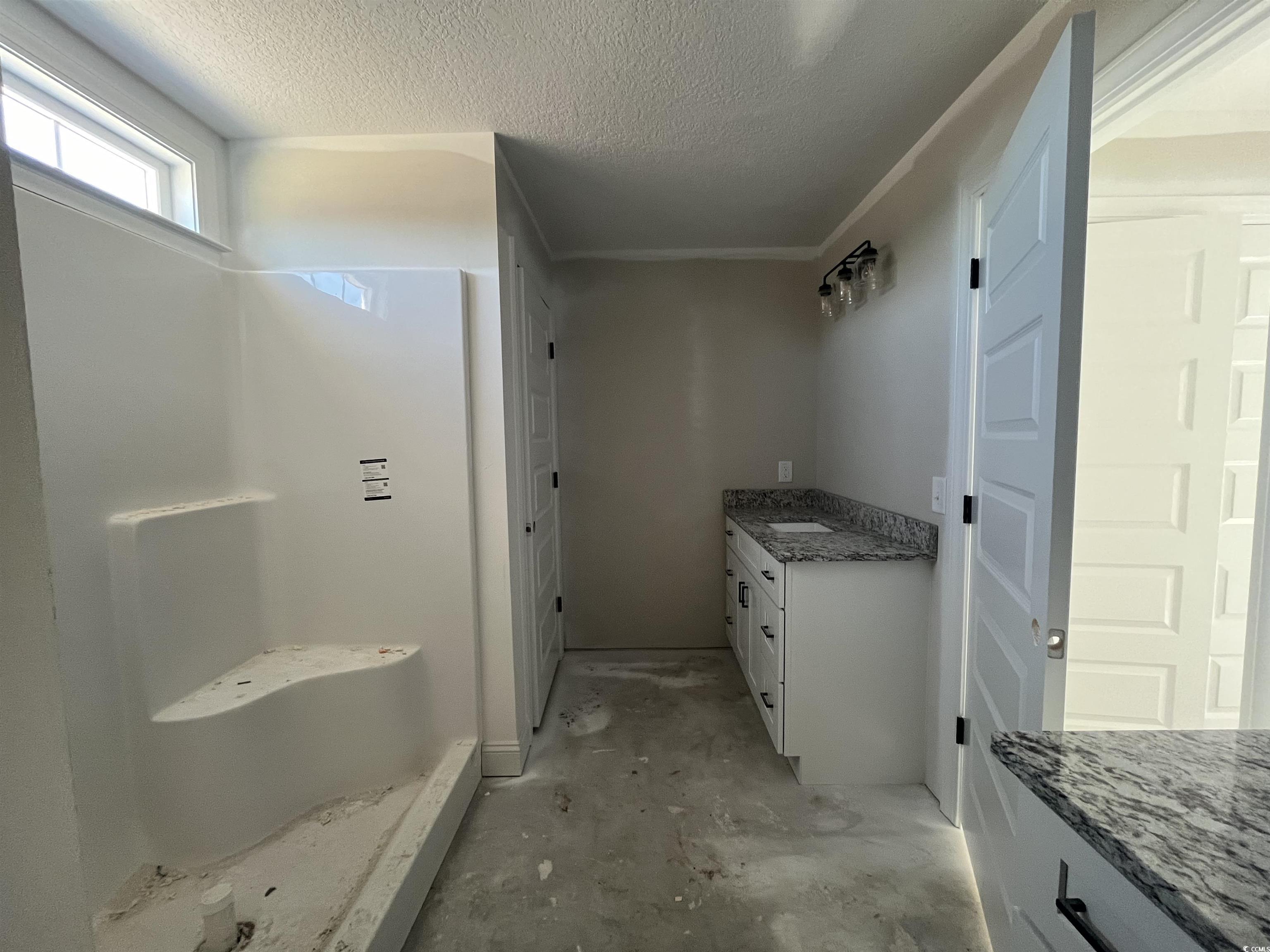 479 Highway 348 Loris, SC 29569 - Photo 8 of 13 Bathroom with vanity, concrete floors, a textured