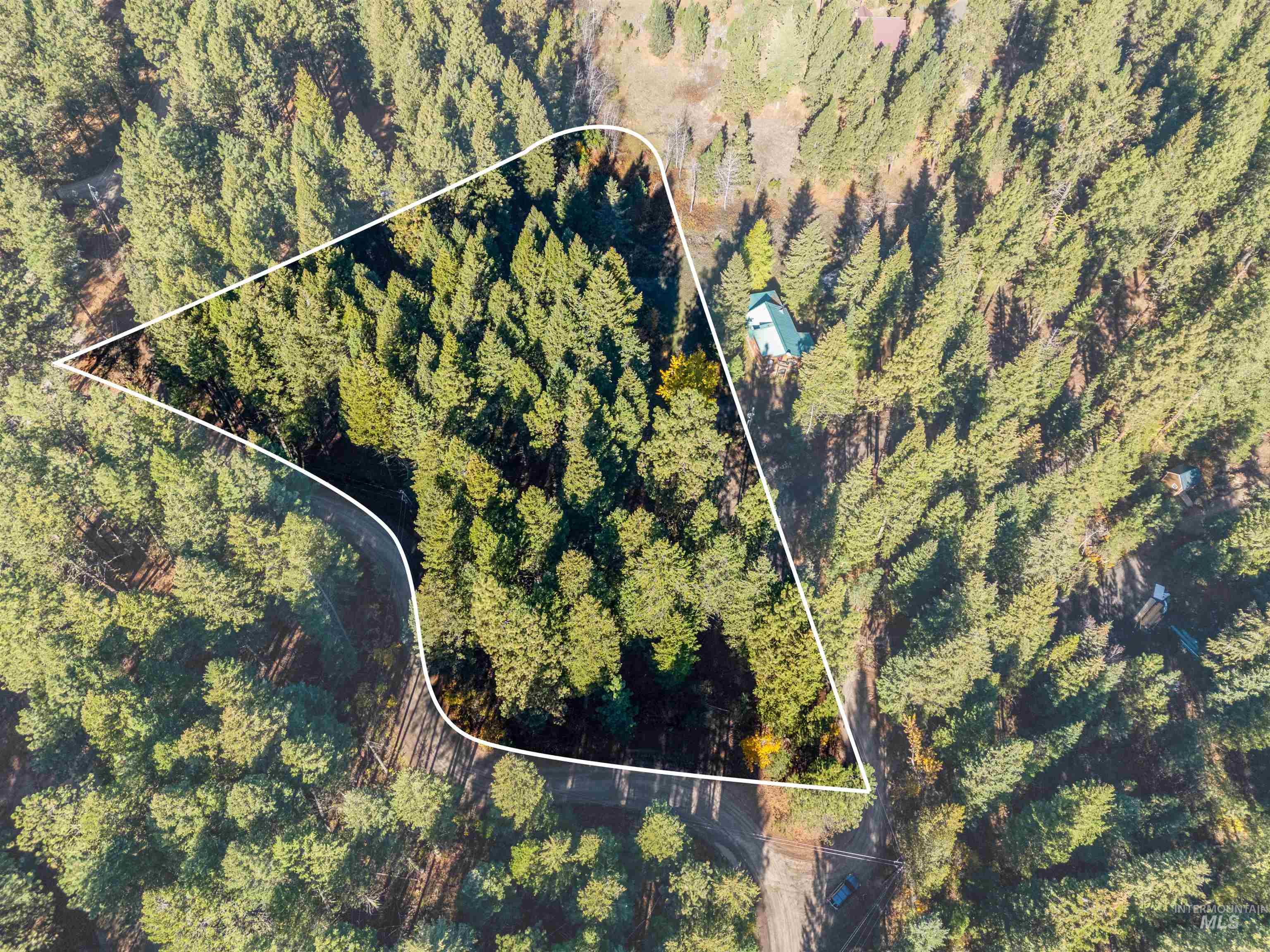 5 Bell Flower Cascade, ID 83611 - Photo 2 of 13 View of property location with property boundaries highlighted and a forest