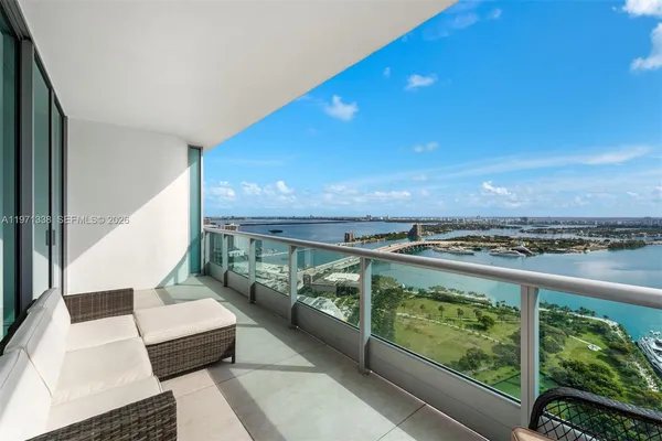 a view of a balcony with lake view and mountain view