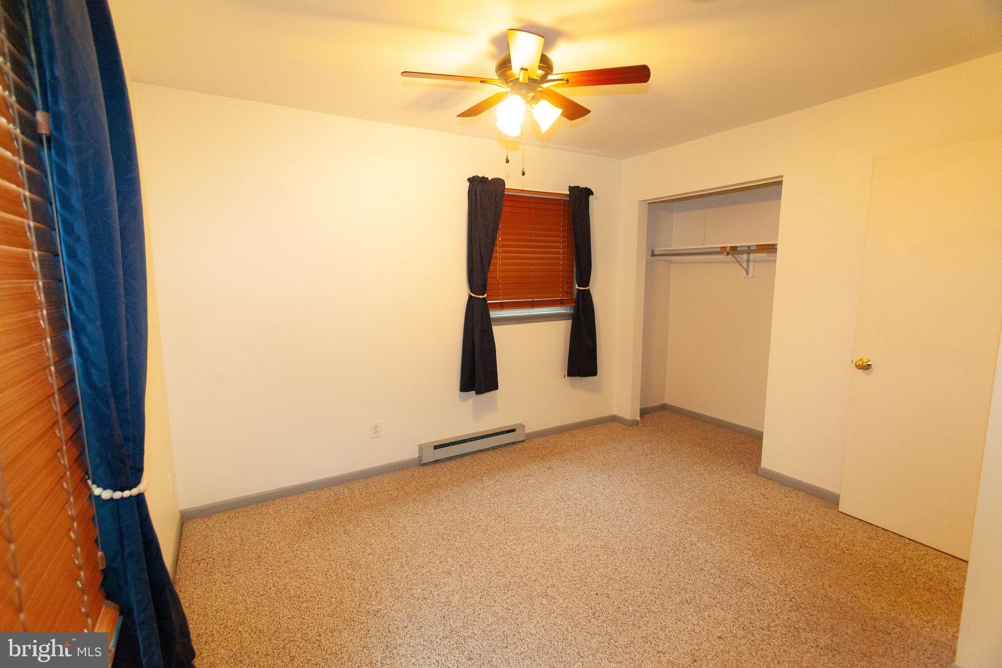 503 Deer Run Road Lititz, PA 17543 - Photo 17 of 35 an empty room with windows and ceiling fan