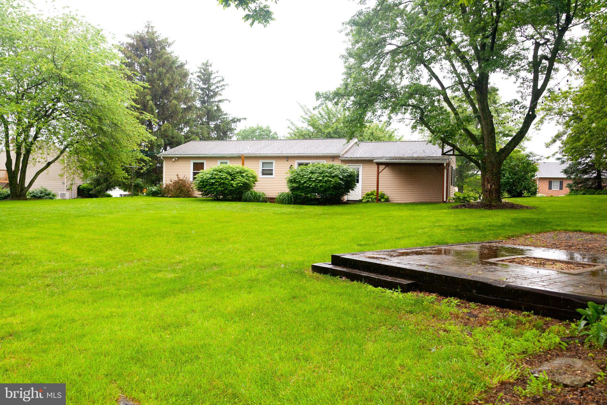 503 Deer Run Road Lititz, PA 17543 - Photo 4 of 35 a view of a backyard with large trees