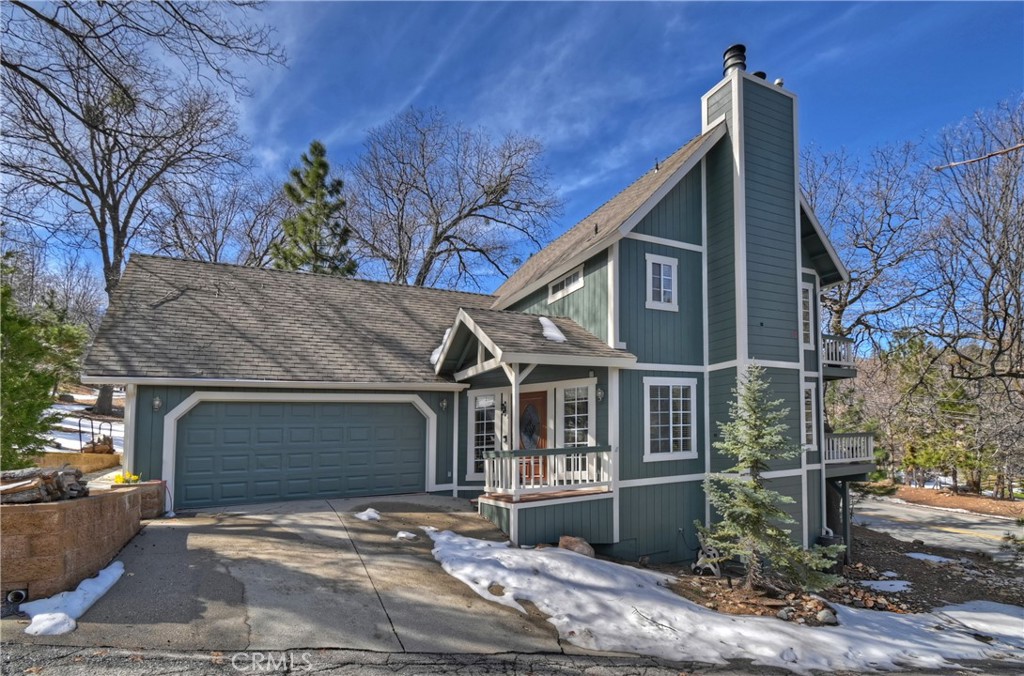 28223 North Bay Road Lake Arrowhead, CA 92352 - Photo 1 of 39 a view of a house with a tree next to a yard