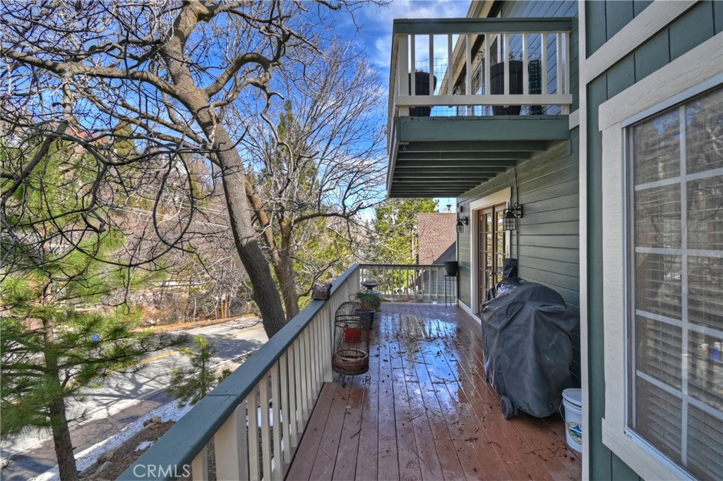 28223 North Bay Road Lake Arrowhead, CA 92352 - Photo 33 of 39 a view of balcony with wooden floor and fence