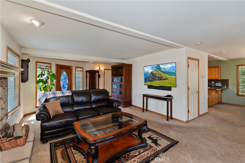 28223 North Bay Road Lake Arrowhead, CA 92352 - Photo 6 of 39 a living room with furniture and a gate