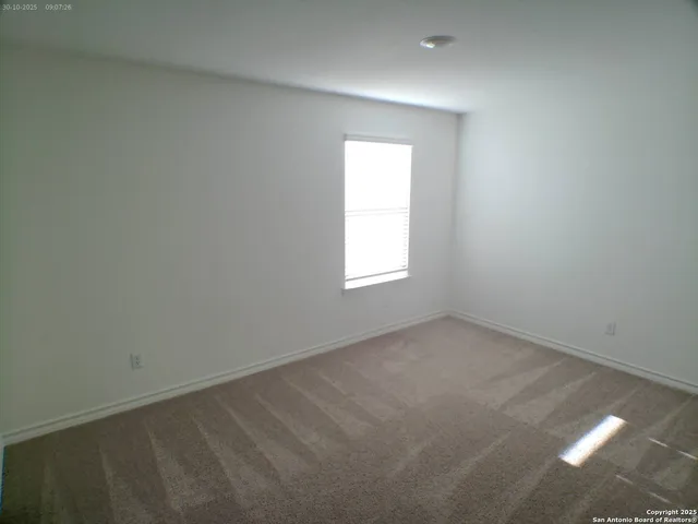 an empty room with a window