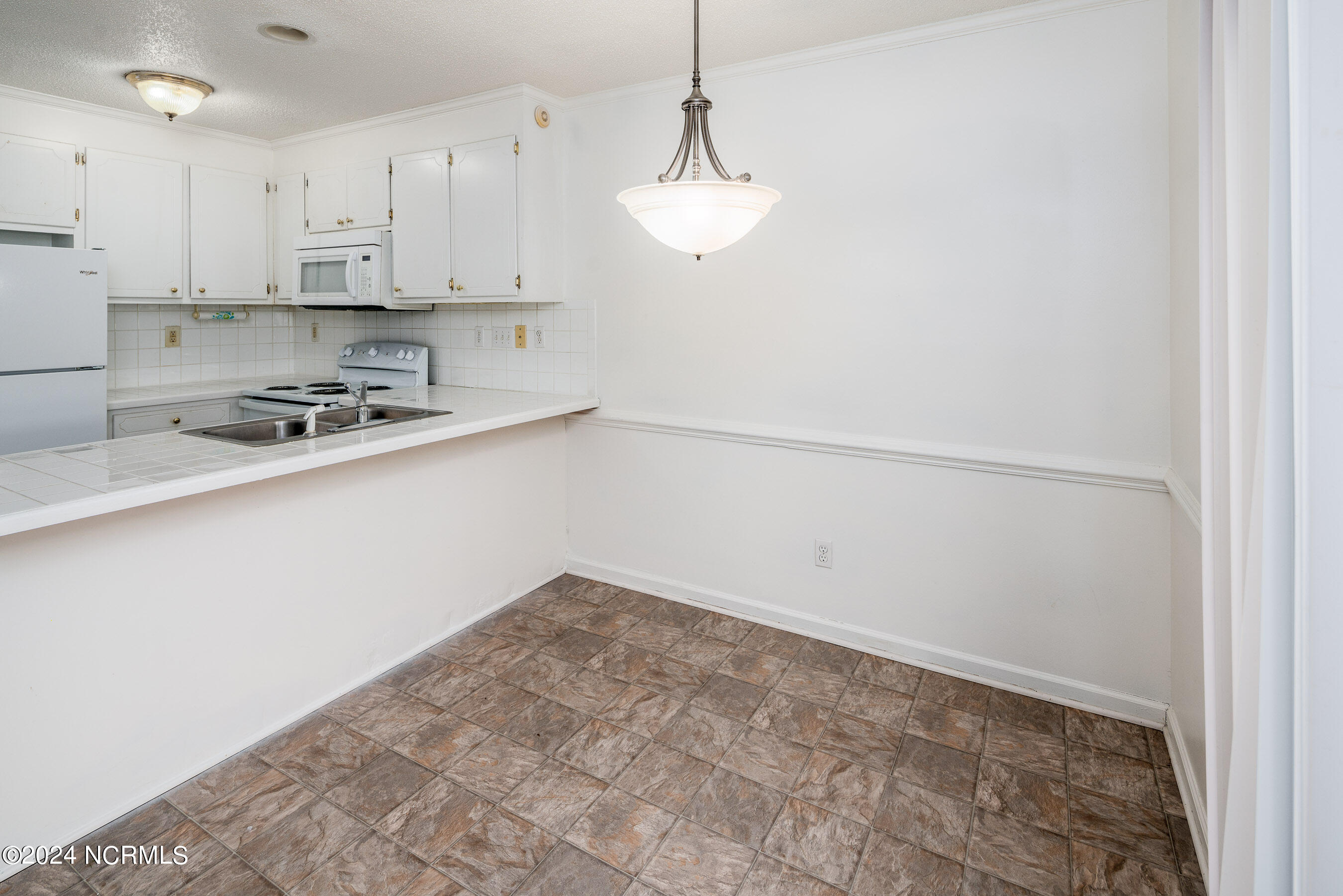 985 Spring Forest Road, Unit C6 Greenville, NC 27834 - Photo 12 of 26 20240117 MLS D_Parker 985 Spring Forest