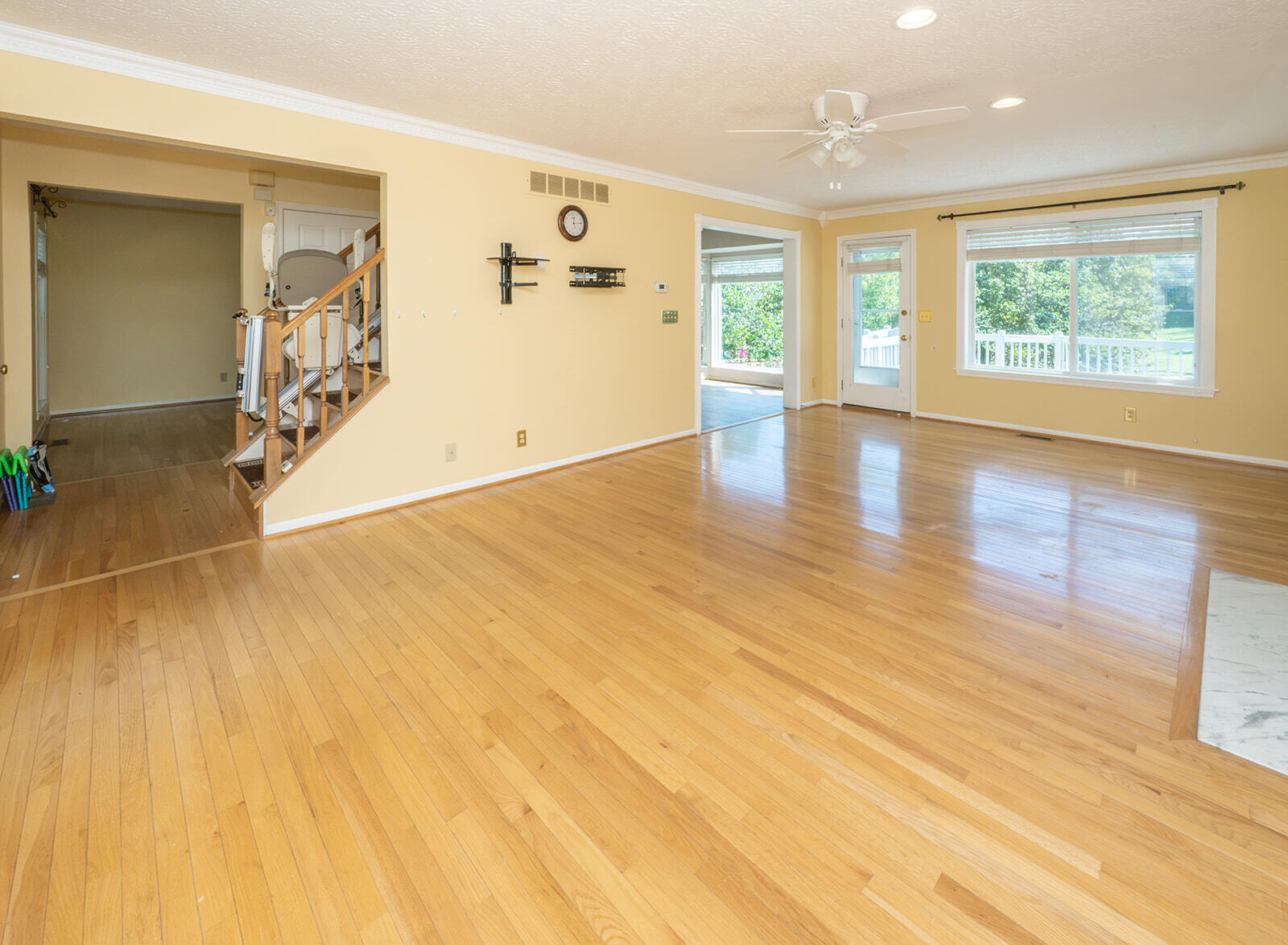 2 Laurel Ridge Drive Alexandria, KY 41001 - Photo 7 of 37 Spacious room featuring wood-finish flooring, a ceiling fan, and multiple windows