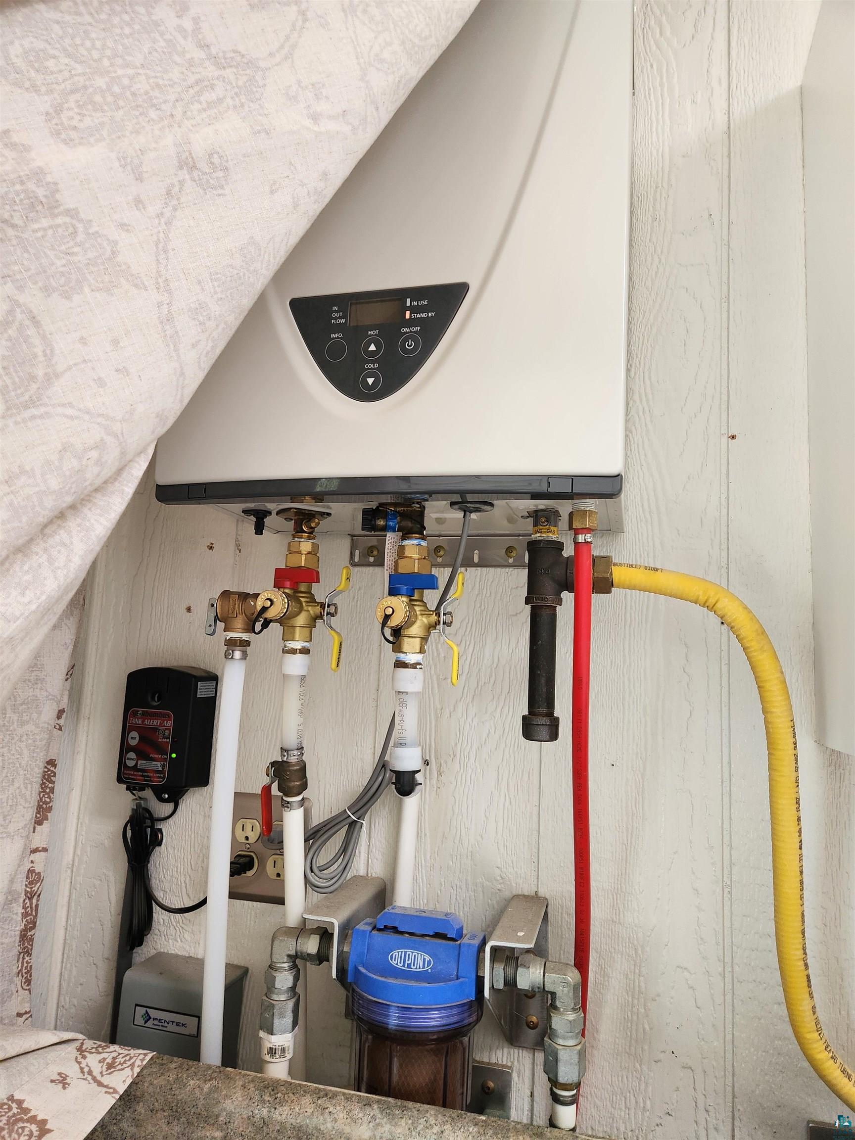 21695 State Highway 13 Cornucopia, WI 54827 - Photo 19 of 33 Central heating and cooling, artesian well water, really smart build!