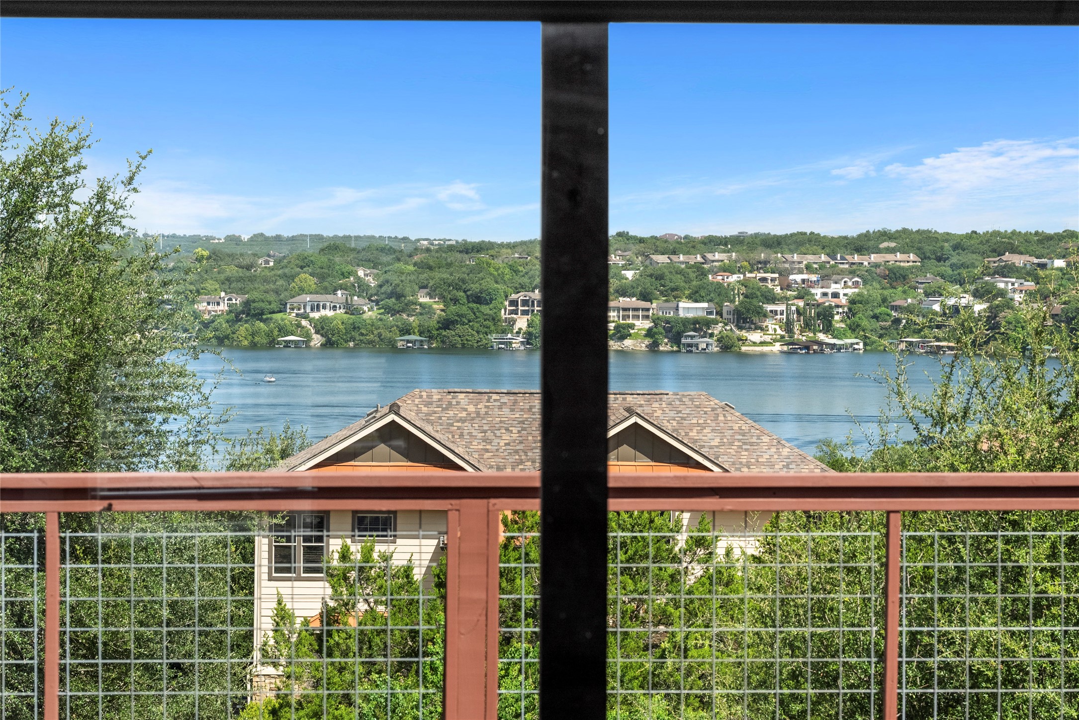 330 Southwind Road Point Venture, TX 78645 - Photo 11 of 40 Living room lake views for days!