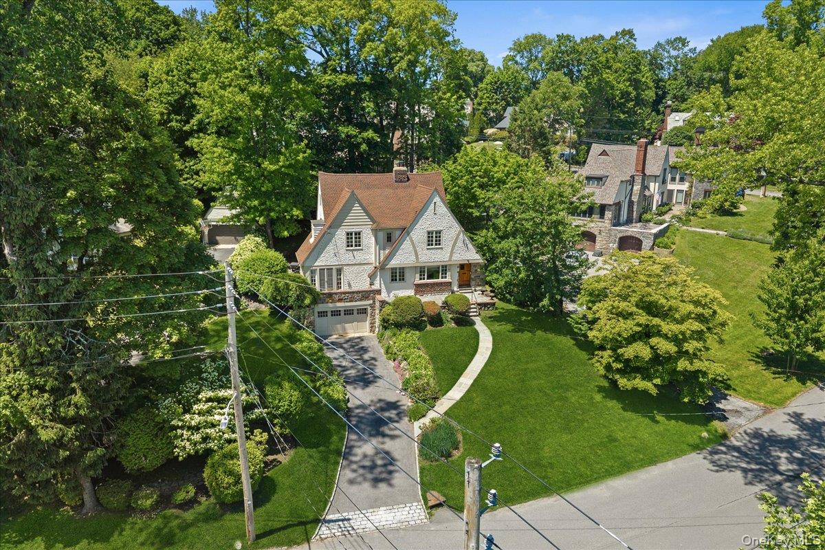 311 Lyncroft Road New Rochelle, NY 10804 - Photo 32 of 39 a aerial view of a house with a garden