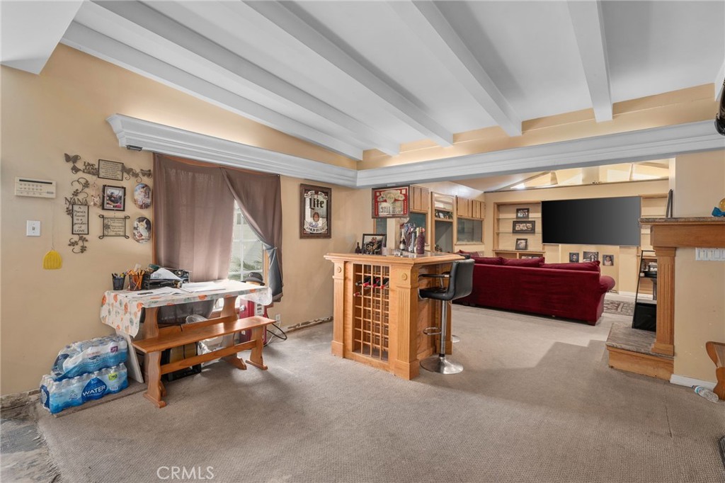 6757 Clifford Street Riverside, CA 92504 - Photo 7 of 25 a living room with furniture and a flat screen tv
