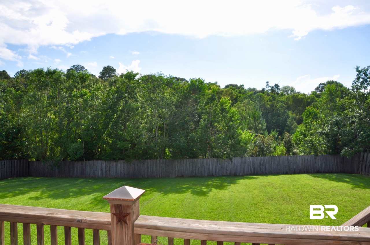 24111 Trowbridge Court Daphne, AL 36526 - Photo 30 of 47 Backyard in Spring/Summer