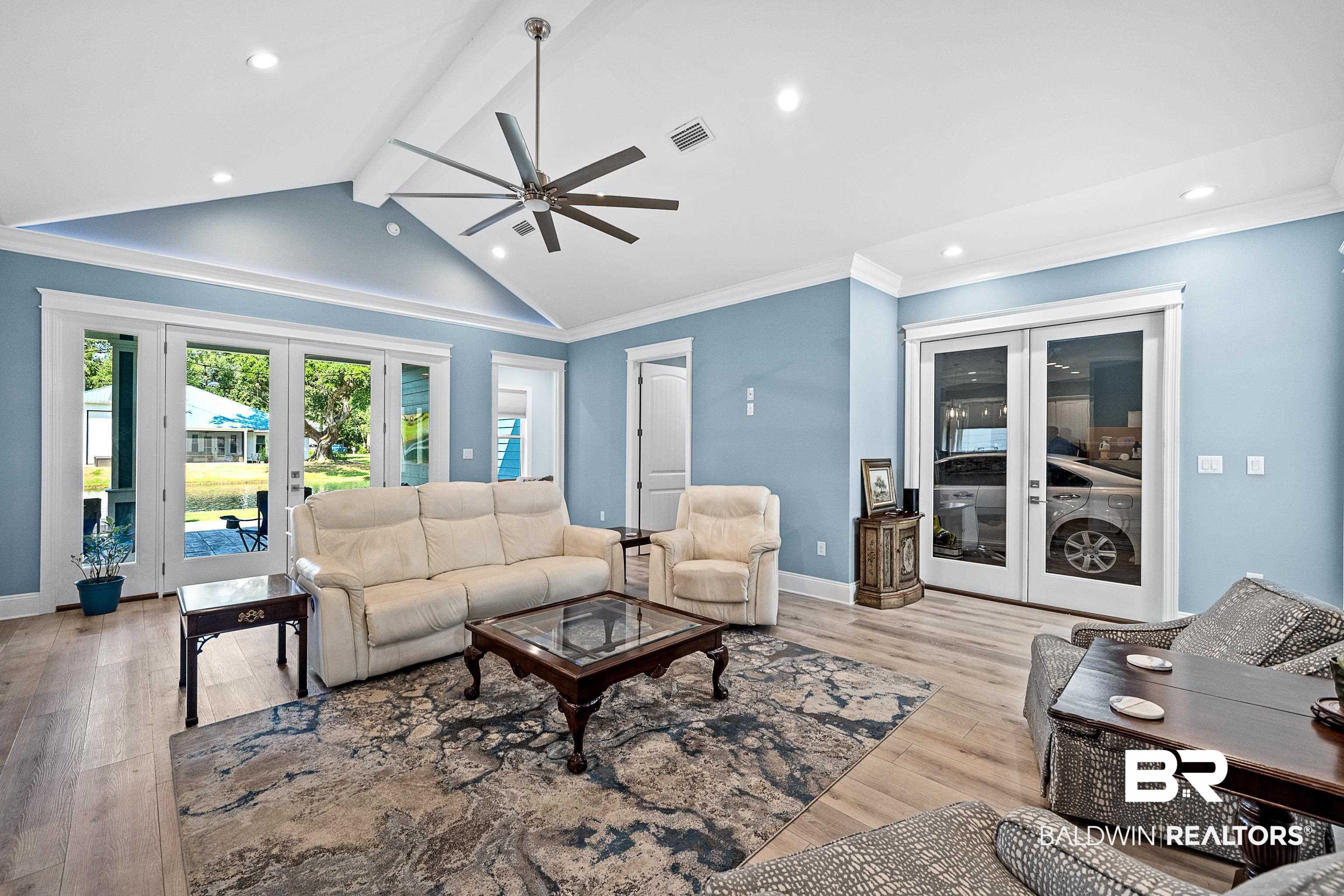12329 Reunion Place, Unit LOT 38 Foley, AL 36535 - Photo 8 of 43 Living room with french doors, beam ceiling, recessed lighting, light wood finished floors, and a ceiling fan
