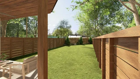 a backyard of a house with wooden floor and outdoor seating