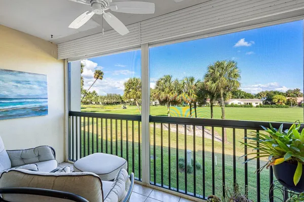 a view of balcony with furniture