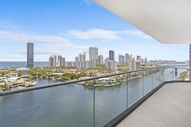 a view of a city skyline from a balcony