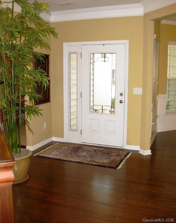 4093 Perth Road, Unit 380 Fort Mill, SC 29707 - Photo 3 of 24 a view of an empty room with wooden floor and a window