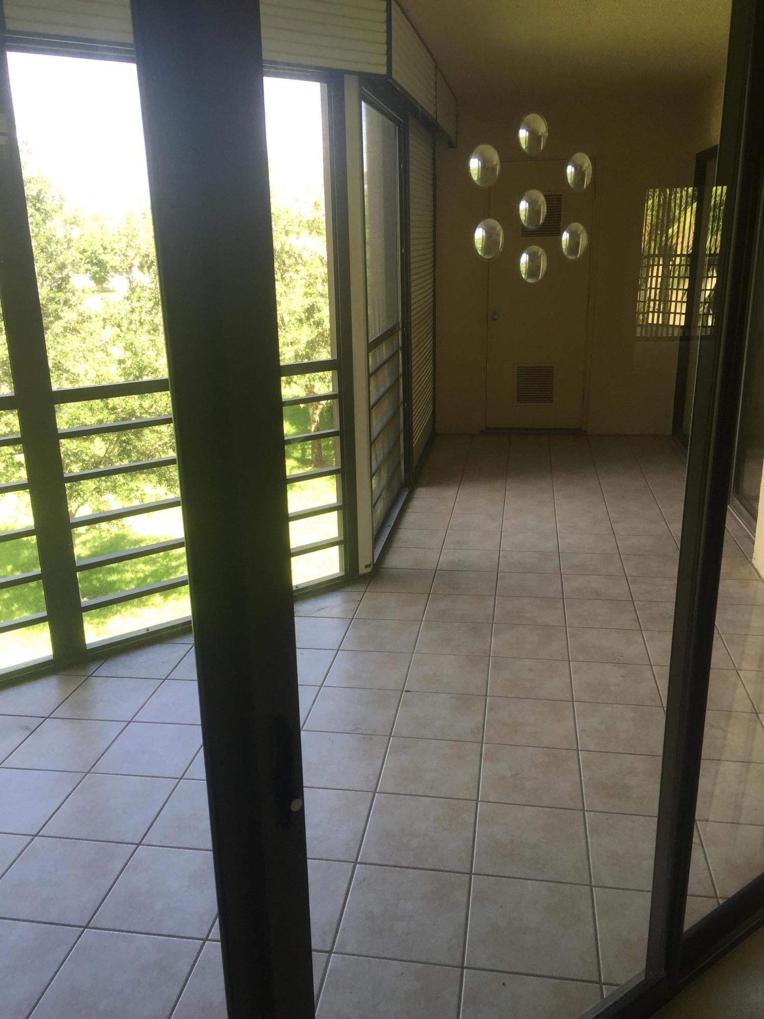 5750 Camino Del Sol, Unit 303 Boca Raton, FL 33433 - Photo 12 of 13 porch