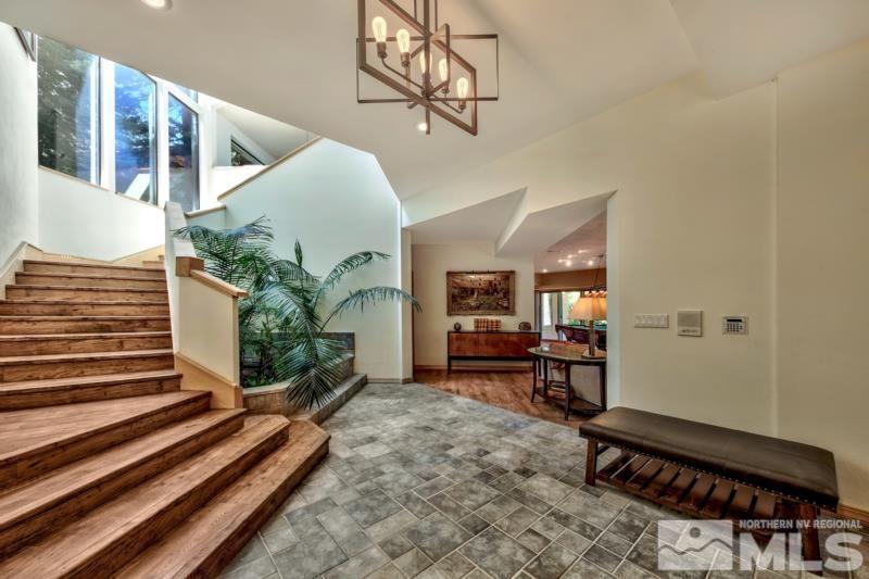 369 Summit Drive Stateline, NV 89449 - Photo 2 of 39 a living room with furniture and a table