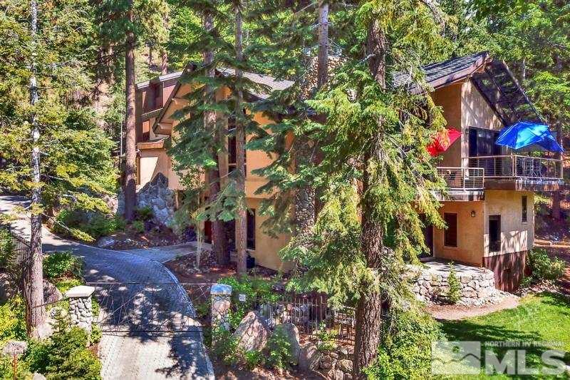 369 Summit Drive Stateline, NV 89449 - Photo 33 of 39 a view of a house with a yard and sitting area