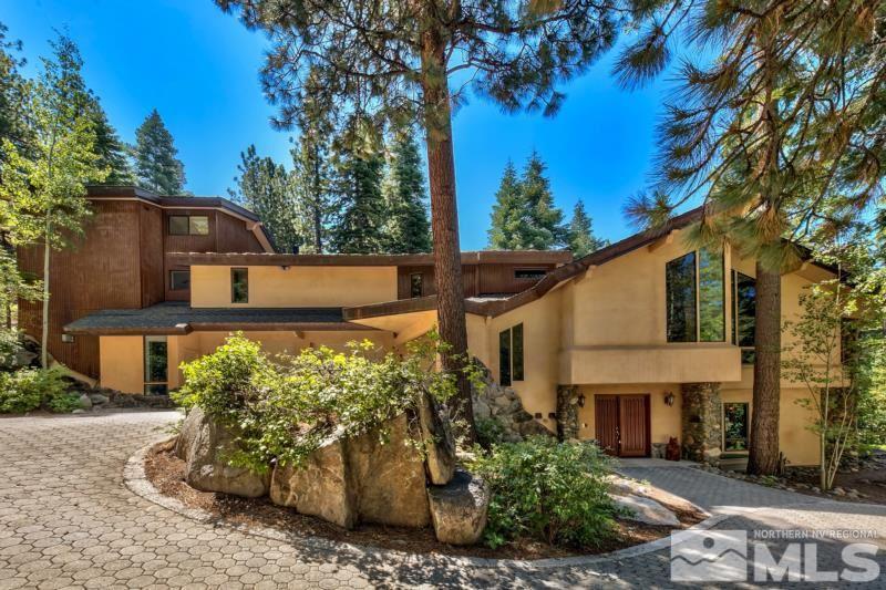 369 Summit Drive Stateline, NV 89449 - Photo 34 of 39 a view of a house with a tree in the background