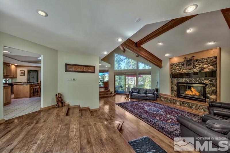 369 Summit Drive Stateline, NV 89449 - Photo 5 of 39 a living room with furniture flat screen tv and a fireplace